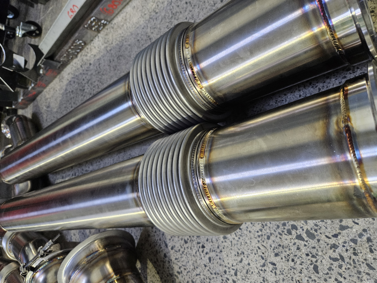 stainless exhaust, with bellow and vband