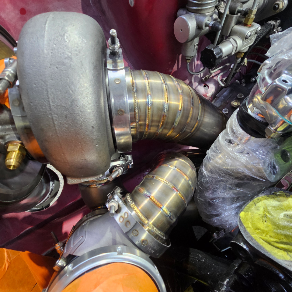 stainless 3.5" piecuts, lobsterback exhaust, downpipe with wastegate screamer